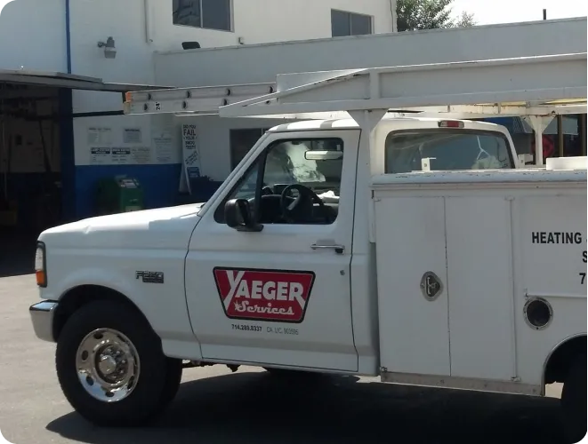 White service truck with company logo